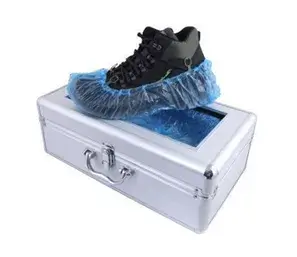 MANUAL SHOE COVER DISPENSER MANUAL SHOE COVER DISPENSER